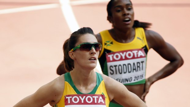 Australia's Lauren Wells looks at her time from the women's 400m hurdles round one at the World Athletics Championships at the Bird's Nest stadium in Beijing.