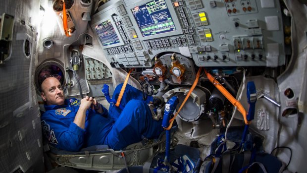 Astronaut Scott Kelly sits inside a Soyuz training simulator at the Gagarin Cosmonaut Training Centre in Star City, Russia, in March. 