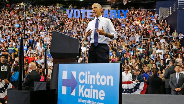 President Barack Obama speaks at a rally for Democratic presidential nominee Hillary Clinton at Florida International University Arena in Miami.