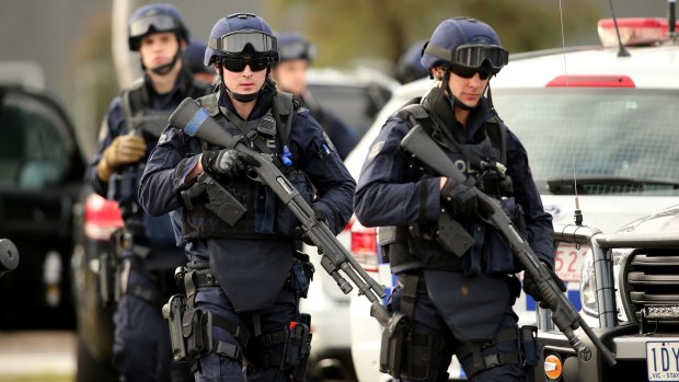 Victoria Police Special Operations Group members outside the Melbourne remand centre.