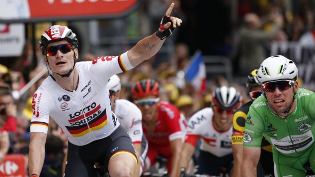Greipel prematurely claims victory. The photo finish showed Cavendish's wheel just edging out the German.