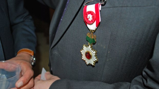 Mr Whight wore his medal proudly during the invitation-only function.