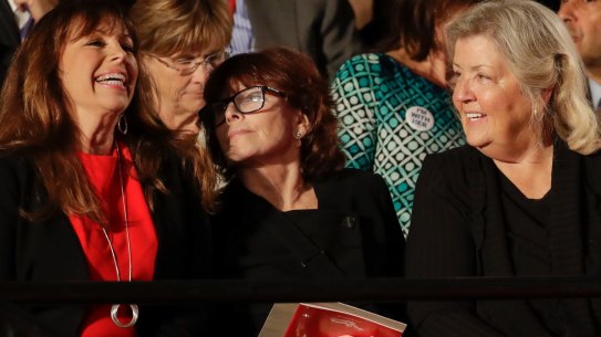 Paula Jones, left, talks with Kathleen Willey and Juanita Broaddrick before the second presidential debate.