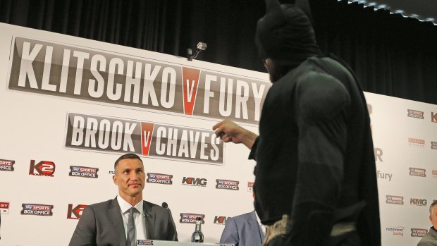Holy title fight!: World heavyweight champion Wladimir Klitschko, may have underestimated Tyson Fury, dressed as Batman before the fight. 