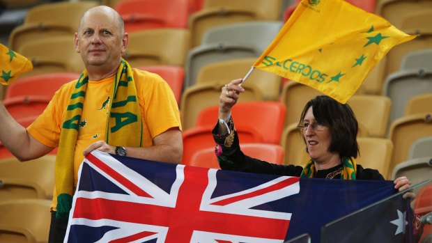 Australian fans fly the flag for the Socceroos in Jeddah.