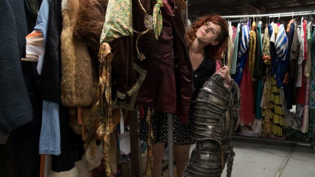 Costume party: Sara Kolijn inspects some of the treasures that will go into the sale.