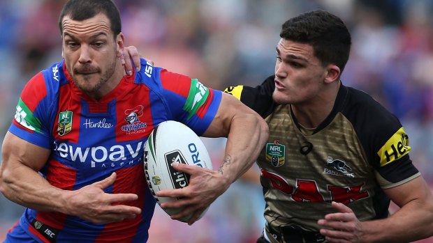 Questions over future: Jarrod Mullen is tackled by Panthers young gun Nathan Cleary.