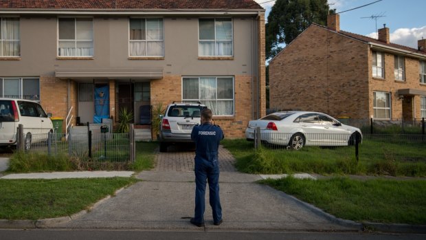 Police outside Habib Ali's home in Perth Street, West Heidelberg.