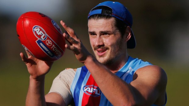 Tom Boyd marks the ball at training on Saturday.