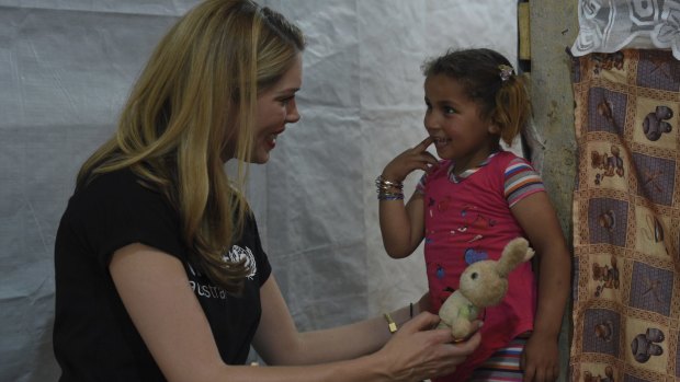 Tara Moss meets Reem, 4, for the first time in a UNICEF-supported early education program run for the children of seven informal settlements in the Bekaa Valley of Lebanon. There are more than 1500 informal settlements housing Syrian refugees throughout Lebanon. 