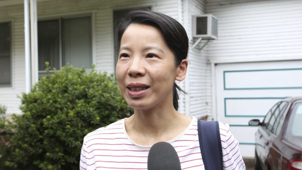 Kathy Lin leaves her North Epping home to visit her husband Robert Xie in jail on Wednesday.