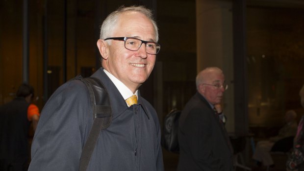 Minister for Communications Malcolm Turnbull leaves the Sydney Institute event on Wednesday.