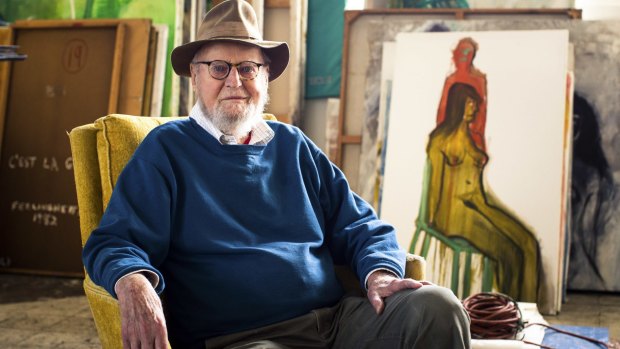 Lawrence Ferlinghetti sits next to his painting, "Monkey on Back", at his studio in San Francisco, aged 97.