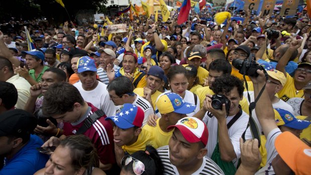 Fury with the government of President Nicolas Maduro erupts on the streets of Caracas in May. The nation has been beset by political problems since the price of oil plunged.