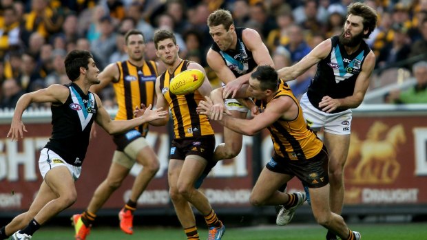 Port Adelaide's Jay Schulz leaps for a big pack mark during the preliminary final against Hawthorn at the MCG in September last year.