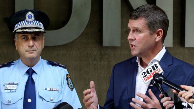 "Fight for our freedoms": Mr Baird with Acting Deputy Commissioner Frank Mennilli.