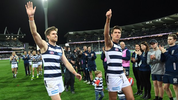 Home and away: Tom Longergan (left) and Andrew Mackie farewell fans at Symonds Stadium in Geelong after the win over GWS. 