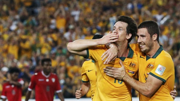 Robbie Kruse, left, pictured with Matthew Leckie, has had an impressive Asian Cup campaign.