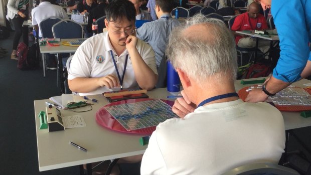 Competitors consider their next move in the 2015 World Scrabble Championships in Perth. 