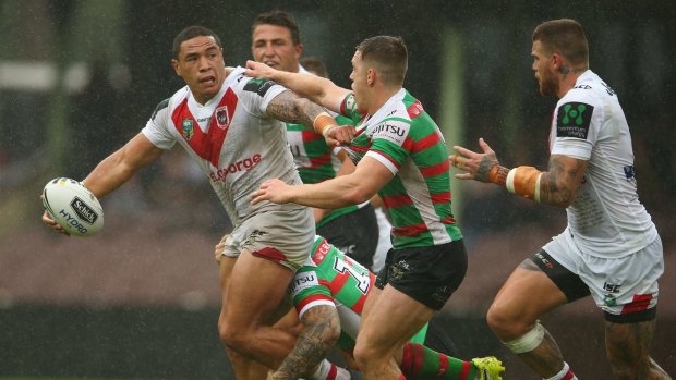 Tough yards: Tyson Frizell offloads during the Dragons' win over the Rabbitohs last Sunday.