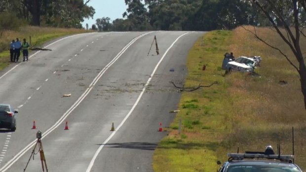 The crash scene where two young Queensland brothers died and another was seriously injured.