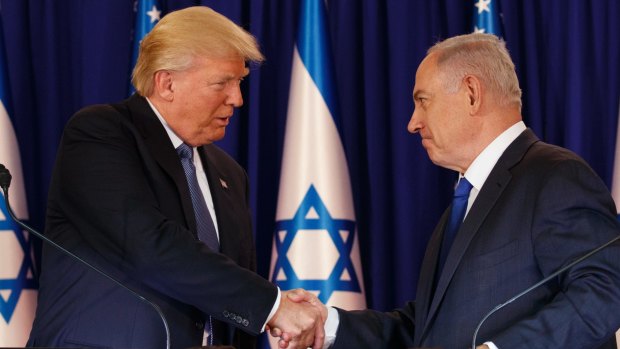 US President Donald Trump shakes hands with Israeli Prime Minister Benjamin Netanyahu after their joint statement in Jerusalem.