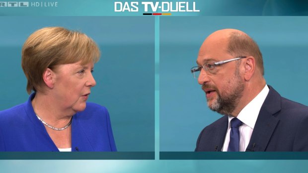 German Chancellor Angela Merkel, left, and her challenger Martin Schulz of the Social Democratic party as they participate in a TV debate.
