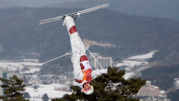 Defying gravity: Mikael Kingsbury jumps during the men's moguls qualifier.