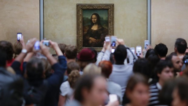The narrator's feeling of alienation is exemplified in a visit to the Louvre, jostling to glimpse the Mona Lisa over the heads of the crowd.