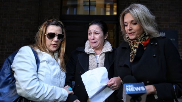 Neke Rezitis (left), Renee Jomaa (center) and Christina Arciuli (right), friends of murdered woman Victoria Comrie Cullen make a statement after Christopher Cullen was found guilty.