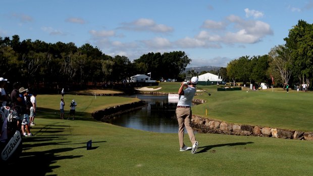 Picturesque: Scott tees off at the RACV Royal Pines Resort.