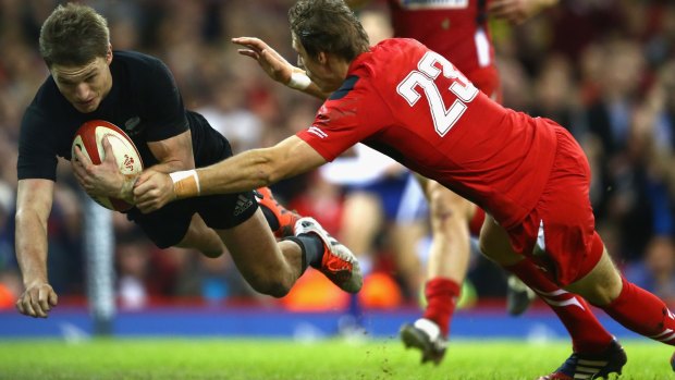 Beauden Barrett dives over to score the All Blacks' third try.