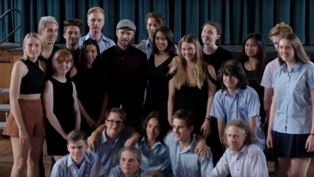 Justin Timberlake with students from Newtown's High School Of The Performing Arts.