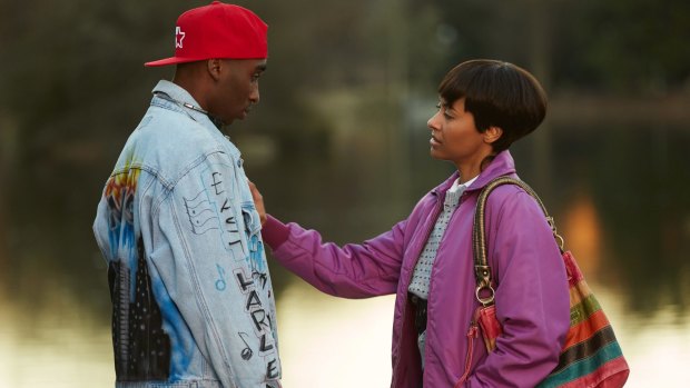 Demetrius Shipp Jr and Kat Graham in All Eyez on Me.