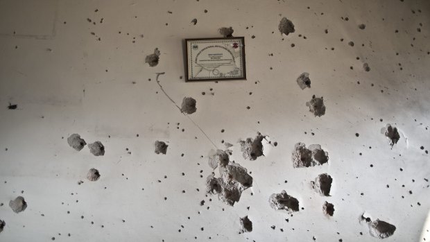 Evidence of firefight: A wall inside the school attacked by Taliban gunmen.
