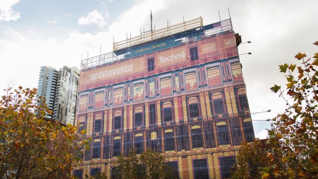 Curtin House has had a designer dress its scaffolding.