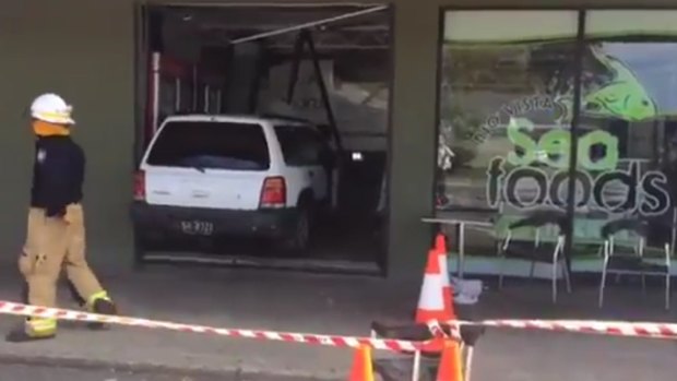 A car has crashed into a fish and chip shop on the Gold Coast, with the driver allegedly blowing over the blood-alcohol limit.