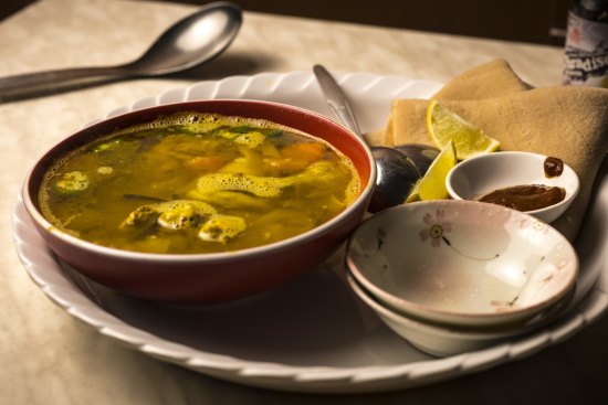 Soulful and supremely comforting: the fitfit (beef soup) served with awaze (chilli paste) and injera.