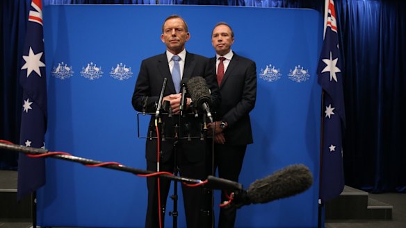 Not our policy: Prime Minister Tony Abbott and Immigration Minister Peter Dutton.