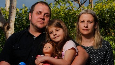 Martin Schmidt with daughter Chloe and wife Karina Schmidt. Chloe's mood and behaviour dramatically changed when she started taking Montelukast.