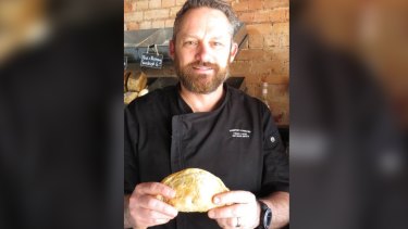 Jason Marion of Toodyay Bakery holds one of Australia's best pasties, as judged by the Baking Association of Australia.