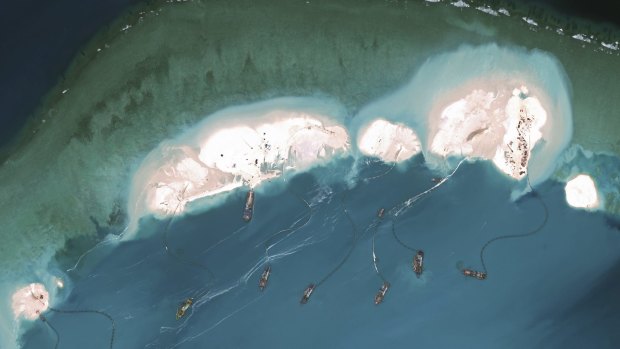 Chinese dredges working in March at the northernmost reclamation site of Mischief Reef, part of the Spratly Islands, in the South China Sea. 