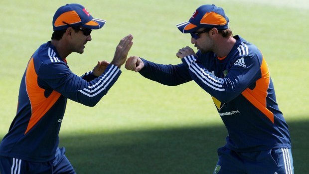 Justin Langer and Phil Hughes working together in the Australian set-up.