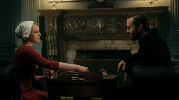 Offred (Elisabeth Moss) and Commander Waterford (Joseph Fiennes) in The Handmaid's Tale.
