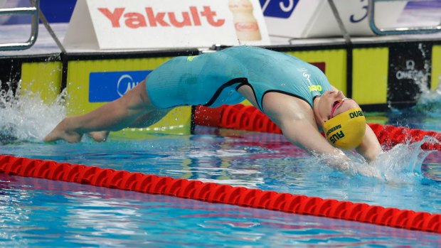 Green and gold: Australia's gold drought is finally over at the world swimming championships in Budapest after Emily Seebohm set a new national record to defend her 200m backstroke crown.
