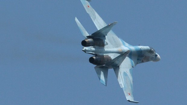 A Russian Sukhoi SU-30 fighter. In recent weeks, Russia has deployed more than two dozen fighter aircraft, attack helicopters and surface-to-air missile defence systems to a base in Syria, according to US officials.