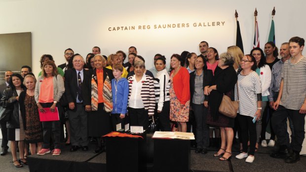 Relatives of Reg Saunders inside the Captain Reg Saunders Gallery.

