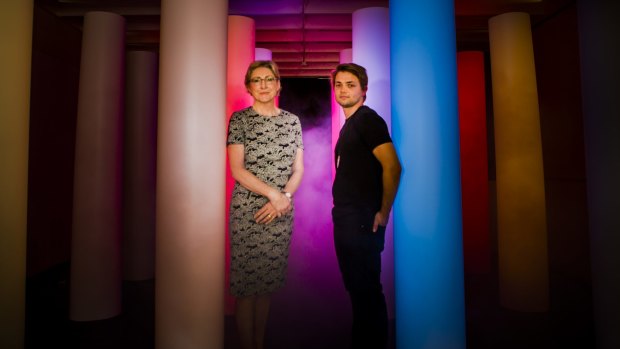 ANU School of Art head Denise Ferris, and graduating honours student Janis Lejins, with his work, <i>Doric Stacks</i>, which transposes real-time data flows into an immerse embodied experience of light, colour and sound.