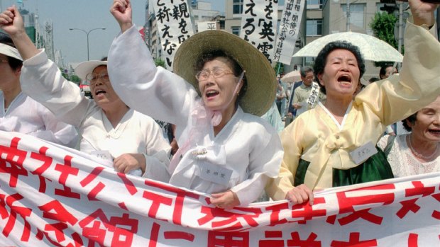 South Korean women protest the cover-up of the use of 'comfort women' in WWII, during a protest in Tokyo in 1995.