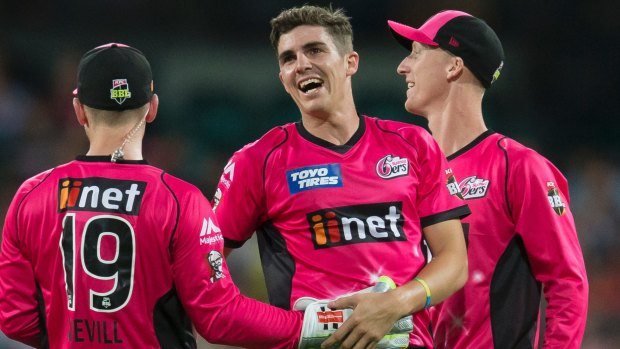 On fire: Sean Abbott claimed four wickets as the Sixers smashed the Brisbane Heat.